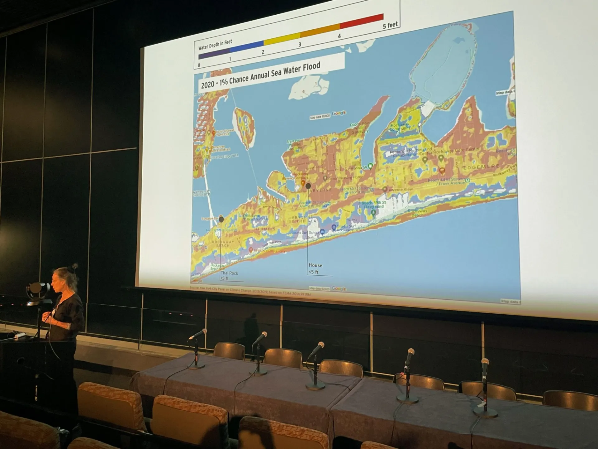 Malgosia Madajewicz presents a slide on water levels from a 100-year flood in Rockaway, Queens.